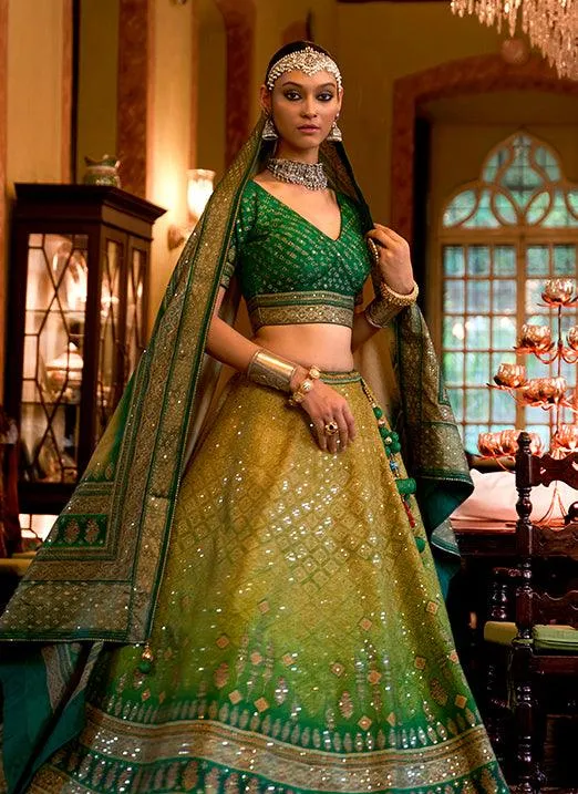 Affectionate Green Bridal Lehenga Choli with Sparkle & Mirror Work in Smooth Rajwadi Silk